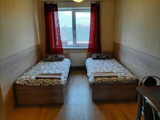 Хостелы ROOMS FOR RENT Паневежис Двухместный номер с 2 отдельными кроватями и общей ванной комнатой-8